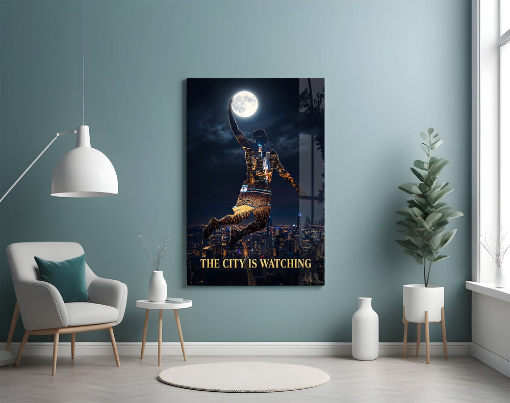 basketball player palming the moon glass wall art styled above an armchair in a reading corner