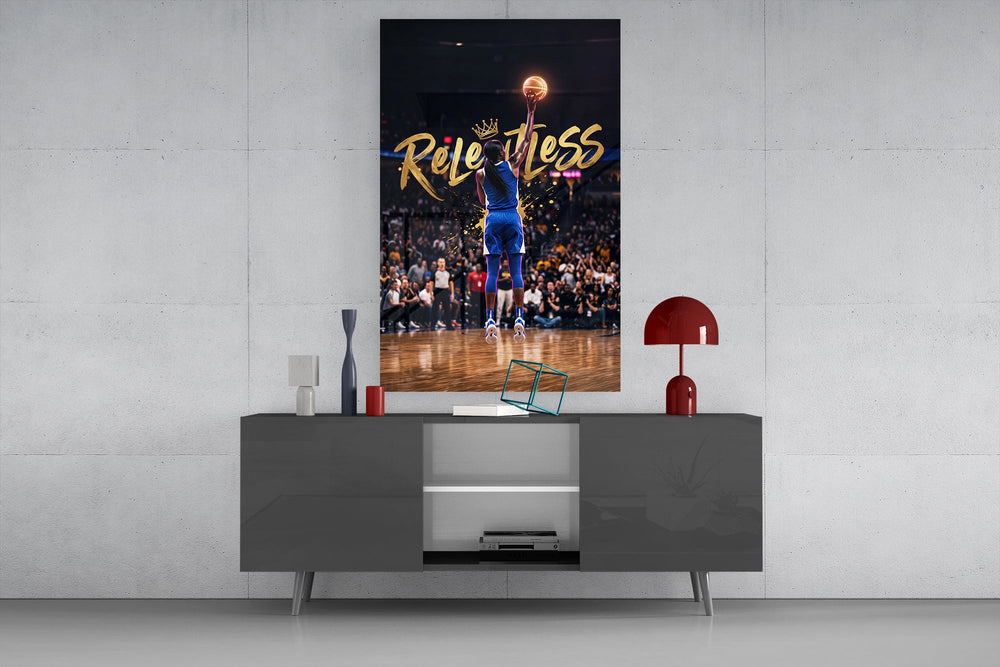 gold Relentless basketball jump shot glass wall art displayed above a console in a designer interior