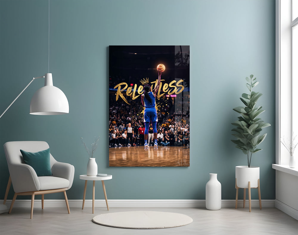 gold Relentless basketball jump shot glass wall art styled above an armchair in a reading corner