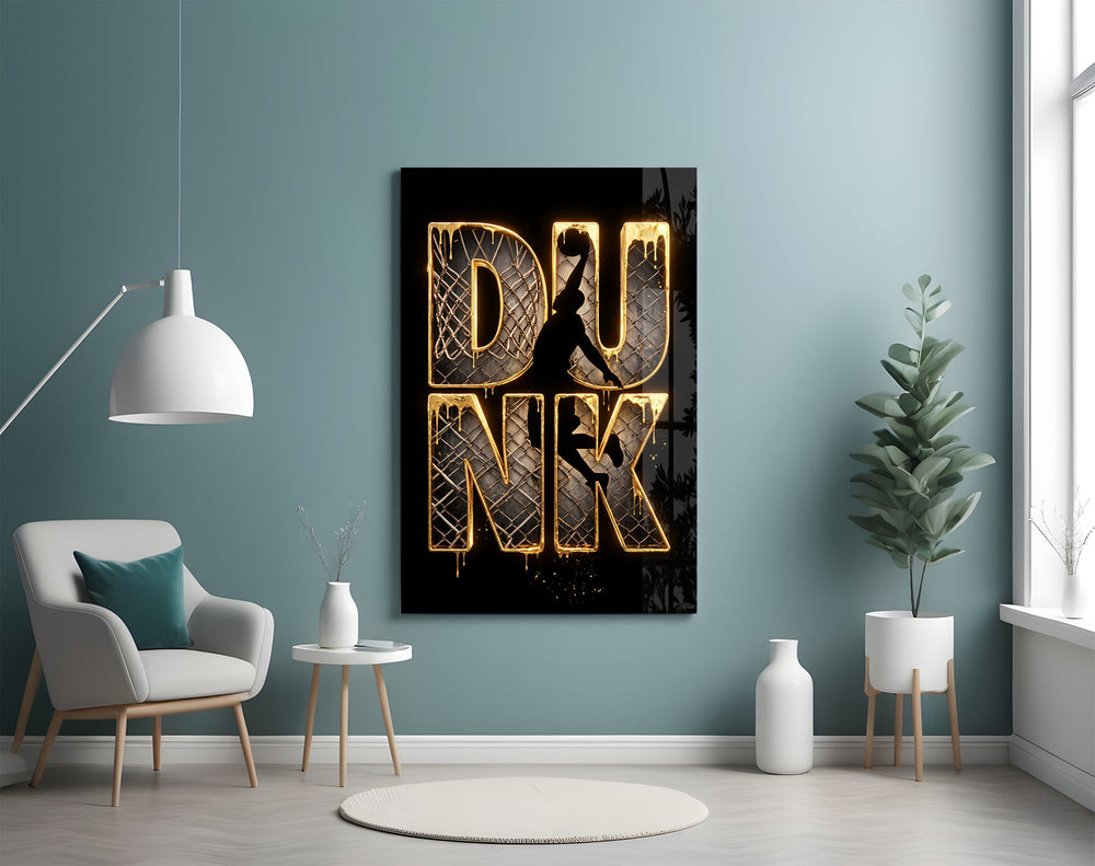 gold Dunk basketball typography glass wall art styled above an armchair in a reading corner
