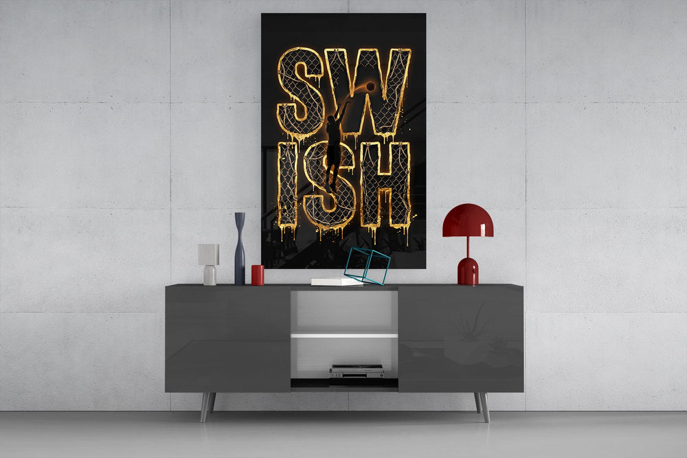 gold Swish basketball typography glass wall art displayed above a console in a designer interior