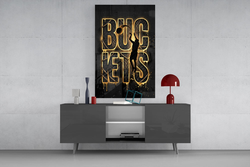 gold basketball typography with a jump-shot silhouette glass wall art displayed above a console in a designer interior