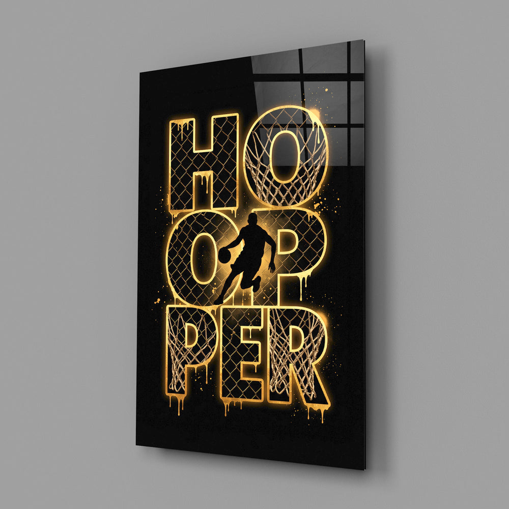 gold basketball typography with a dribbling silhouette glass wall art angled to show the polished tempered glass panel