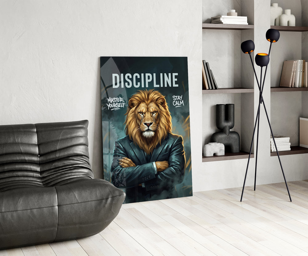 a stern lion in a suit with arms crossed glass wall art leaning beside a dark leather sofa
