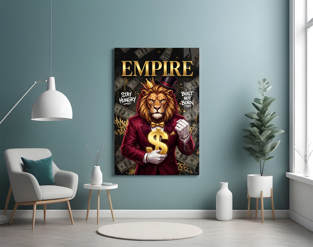 a crowned lion in a red suit holding a gold dollar sign glass wall art styled above an armchair in a reading corner