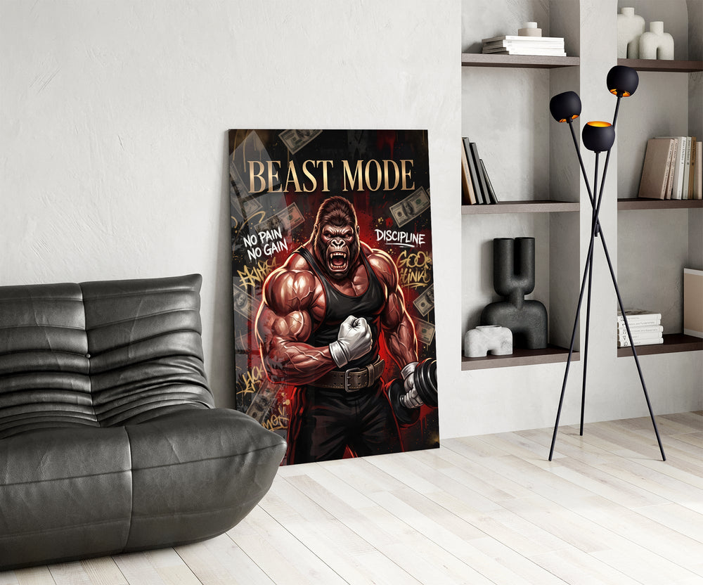 muscular gorilla roaring in a gym glass wall art leaning beside a dark leather sofa