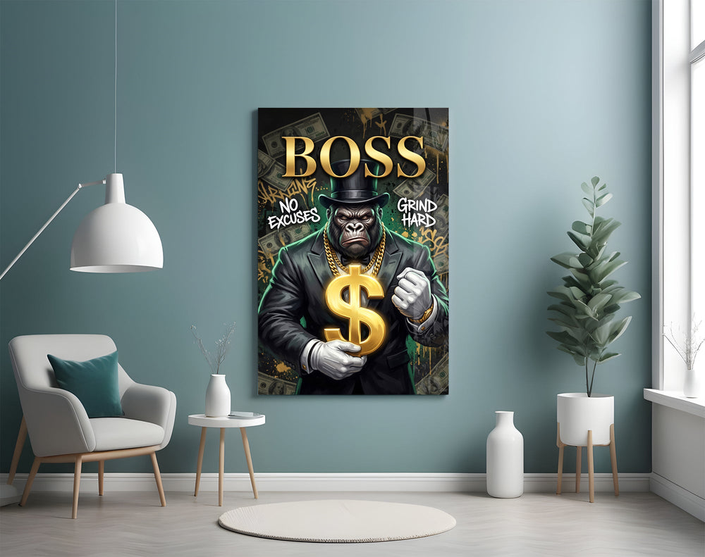 suited gorilla with a gold dollar sign glass wall art styled above an armchair in a reading corner