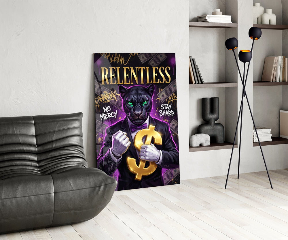 suited green-eyed panther with a gold dollar sign glass wall art leaning beside a dark leather sofa