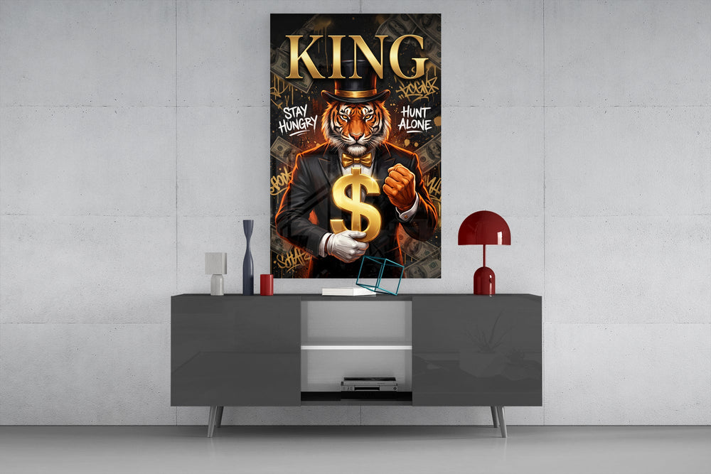 suited tiger with a gold dollar sign glass wall art displayed above a console in a designer interior