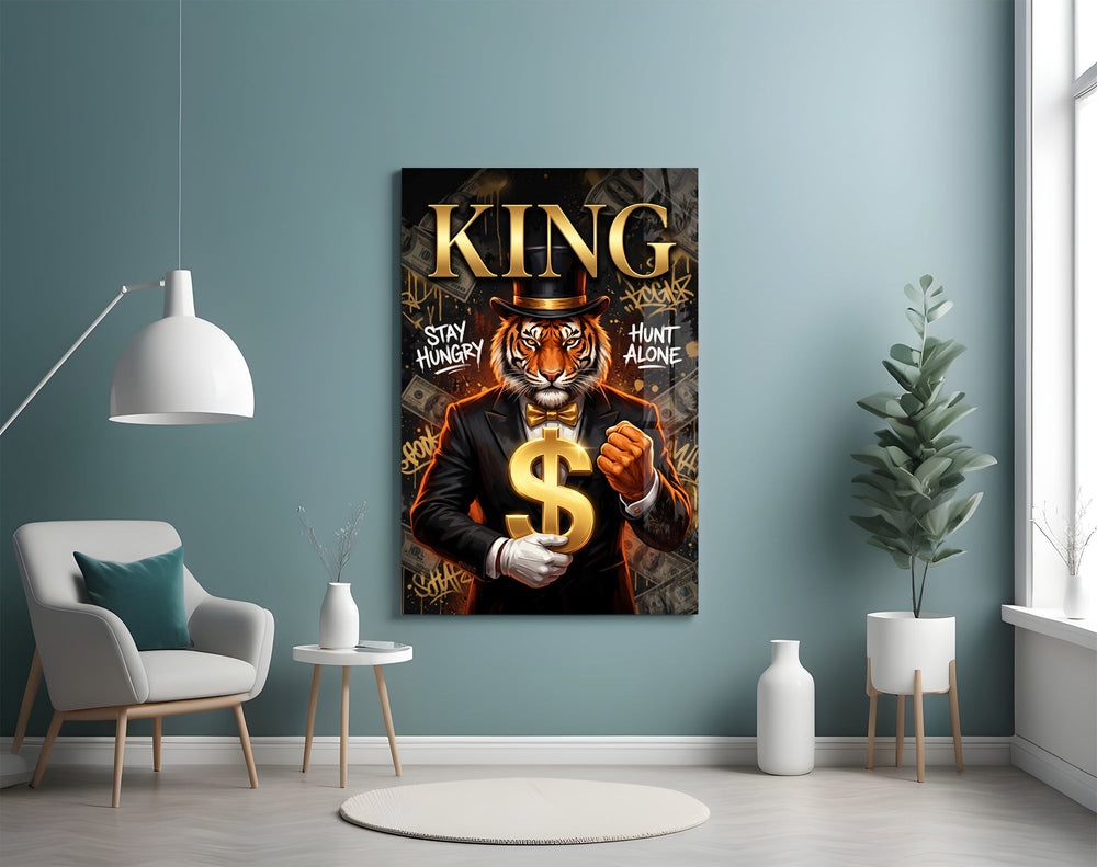 suited tiger with a gold dollar sign glass wall art styled above an armchair in a reading corner