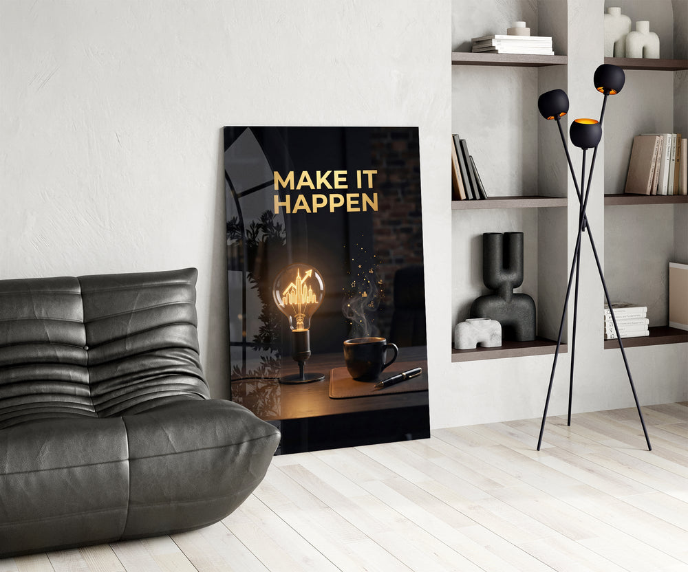 make it happen gold skyline light bulb glass wall art leaning beside a dark leather sofa