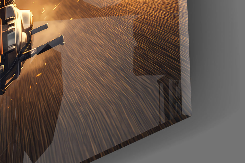 Close-up detail of the golden wings rising from the smoke behind the headlight on the glass surface
