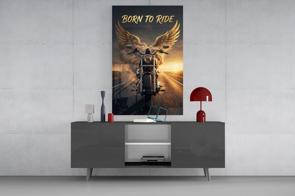 born to ride winged motorcycle glass wall art displayed above a console in a designer interior