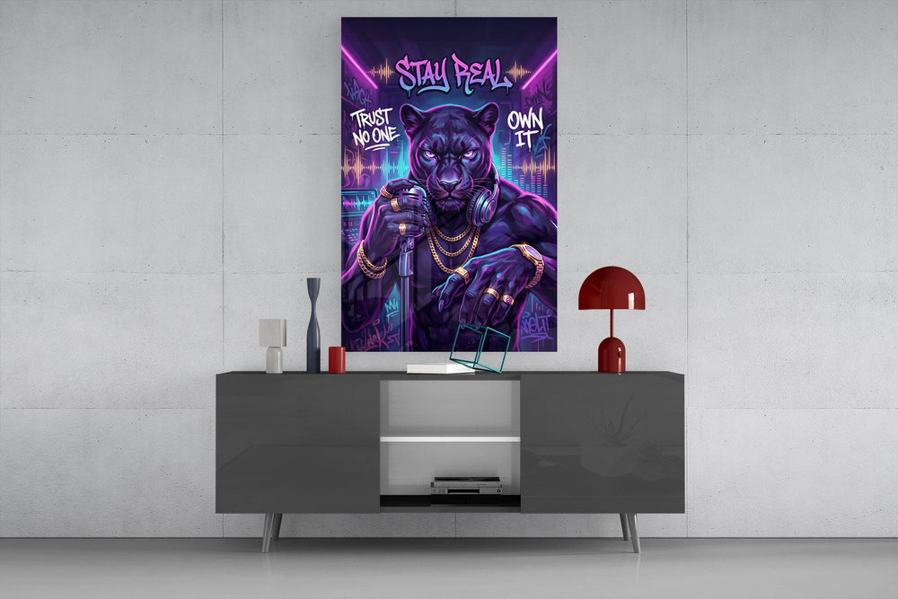 stay real neon panther rapper glass wall art displayed above a console in a designer interior