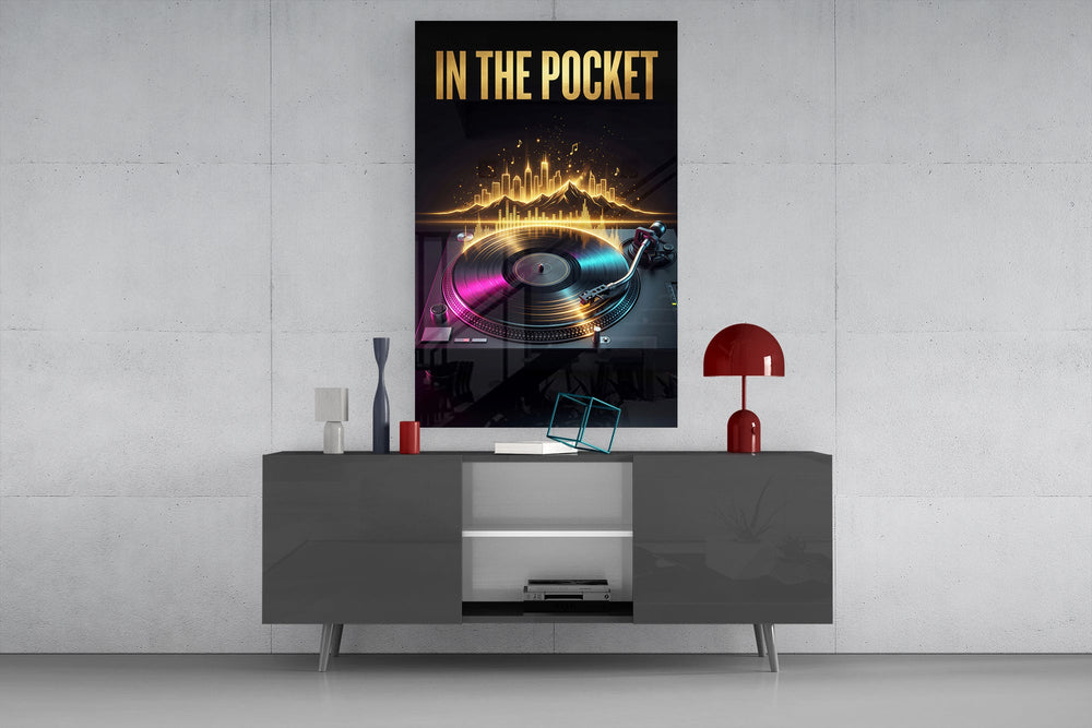 in the pocket golden turntable glass wall art displayed above a console in a designer interior