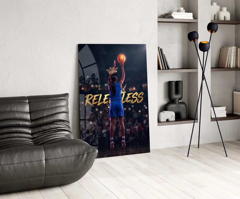 relentless basketball crown shot glass wall art leaning beside a dark leather sofa
