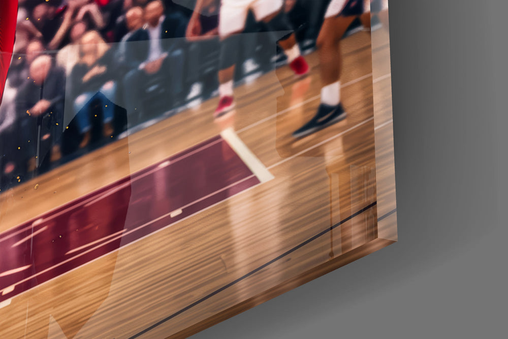 Close-up detail of the floating jeweled crown and the dribbled basketball on the glass surface