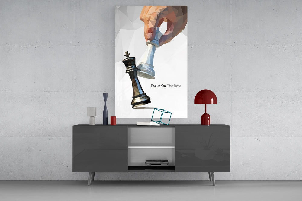 low-poly hand toppling a chess king glass wall art displayed above a console in a designer interior