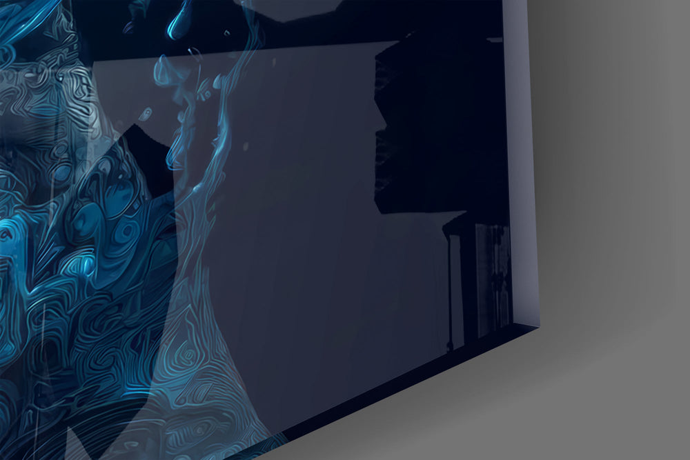 Close-up detail of the carved compass rose and the swirling liquid fingers on the glass surface