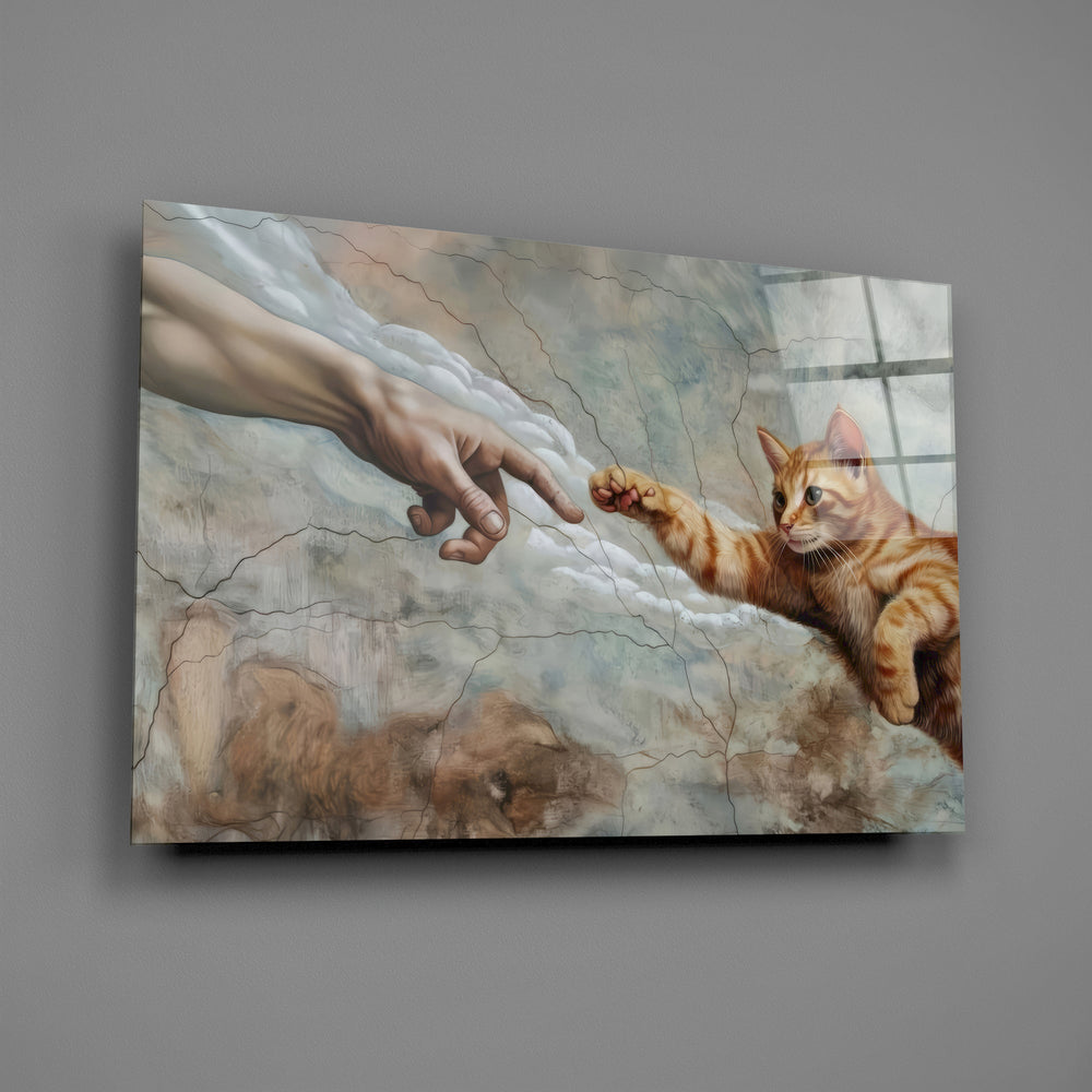 ginger kitten reaching a paw to a human hand glass wall art angled to show the polished tempered glass panel