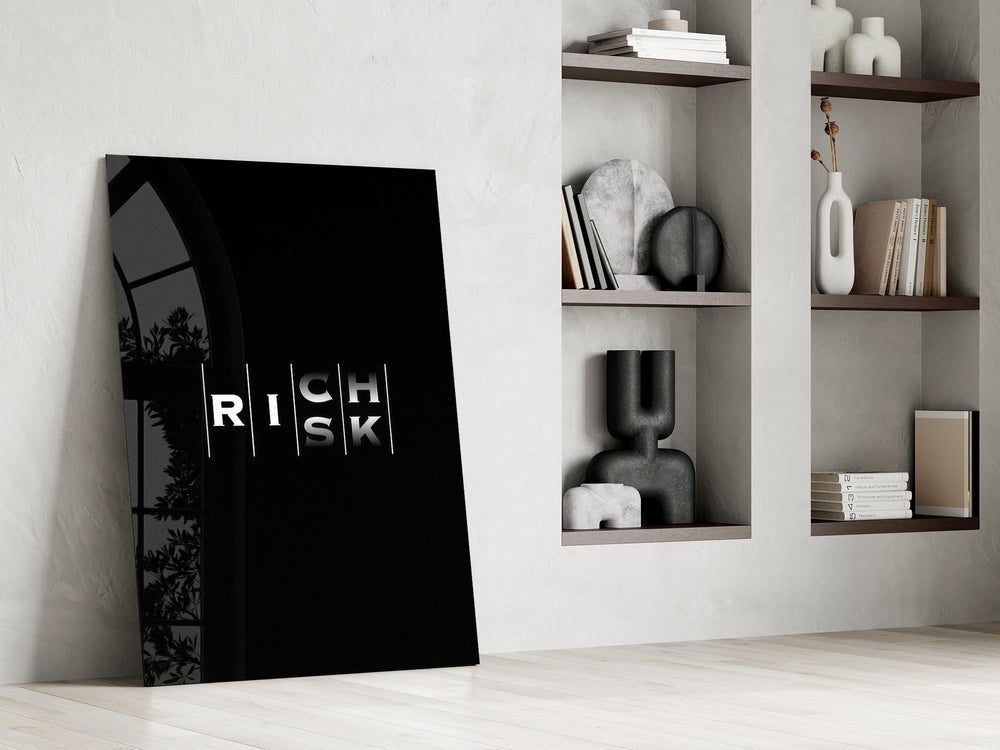 interlocking rich and risk typography panel resting in a shelving niche in a modern interior