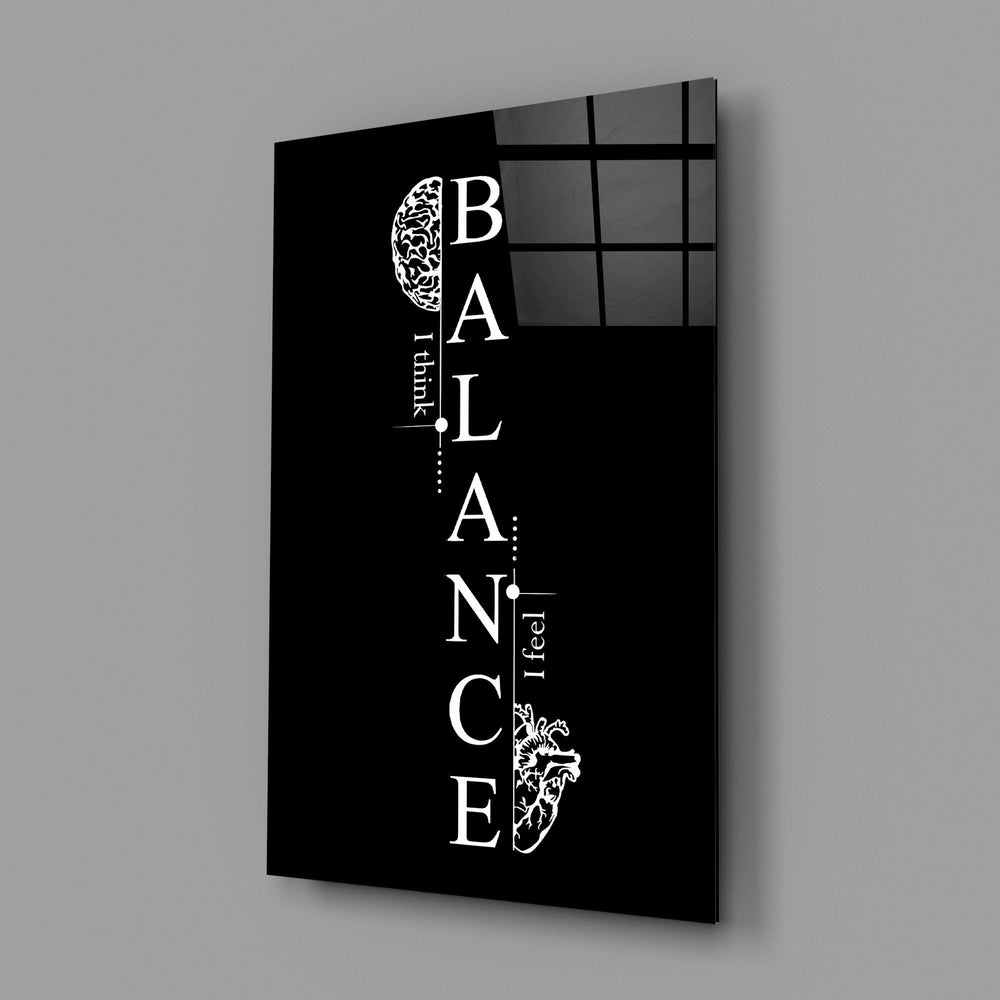 balance brain and heart quote glass wall art angled to show the polished tempered glass panel