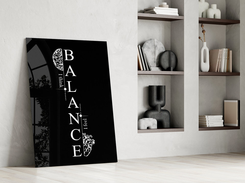balance brain and heart quote panel resting in a shelving niche in a modern interior