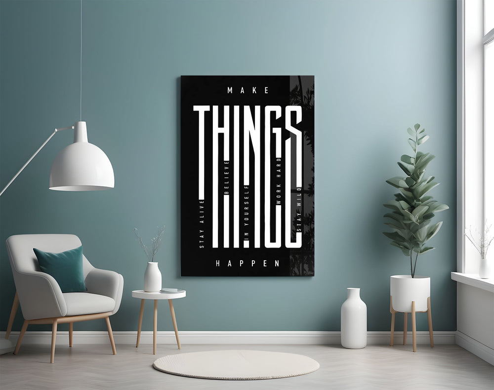 make things happen typography glass wall art styled above an armchair in a reading corner