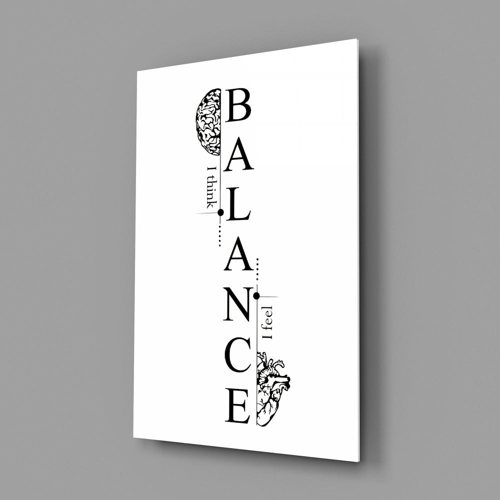 balance brain and heart typography glass wall art angled to show the polished tempered glass panel
