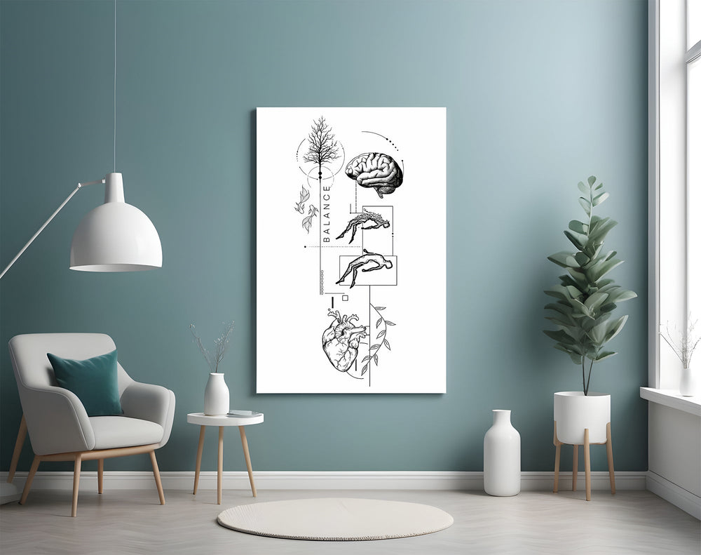 surreal balance collage of brain and heart glass wall art styled above an armchair in a reading corner