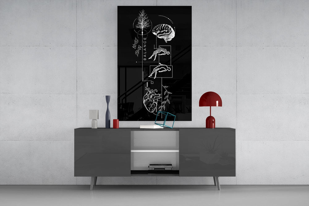 balance brain and heart line art glass wall art displayed above a console in a designer interior
