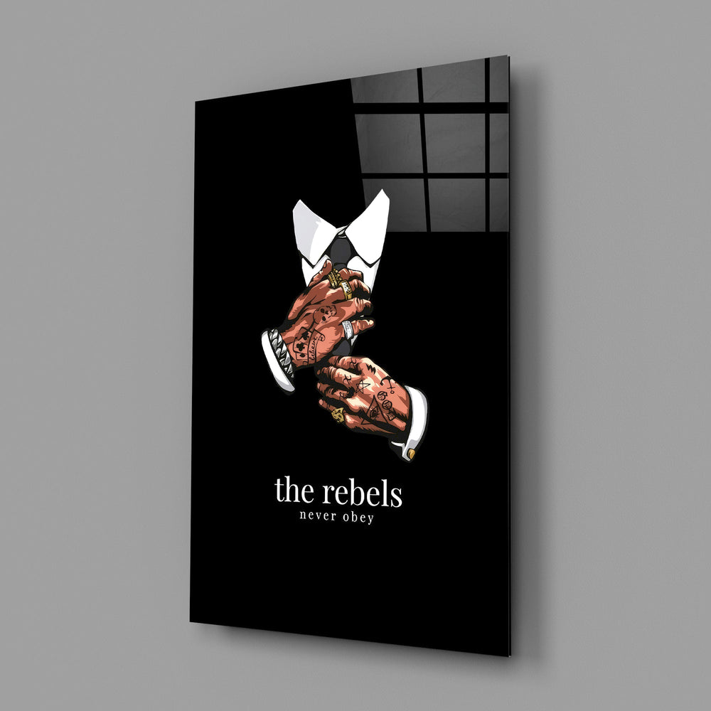 tattooed hands and the words the rebels never obey glass wall art angled to show the polished tempered glass panel