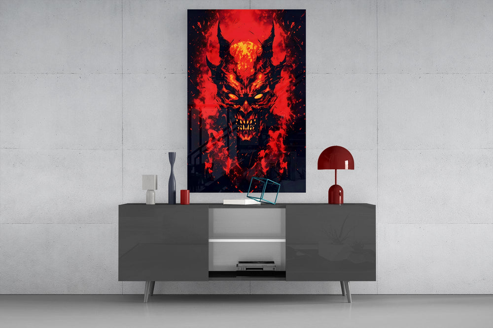 a horned demon face burning out of red flame glass wall art displayed above a console in a designer interior
