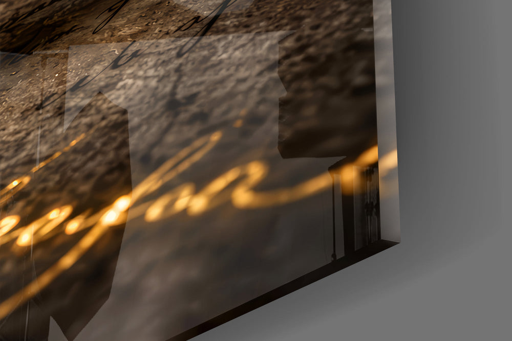 Close-up detail of the golden dust falling from the crumbling stone arches on the glass surface