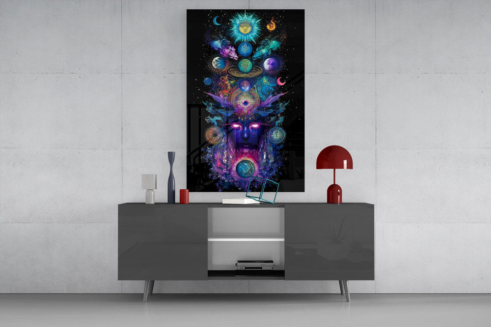 a cosmic deity crowned with planets glass wall art displayed above a console in a designer interior