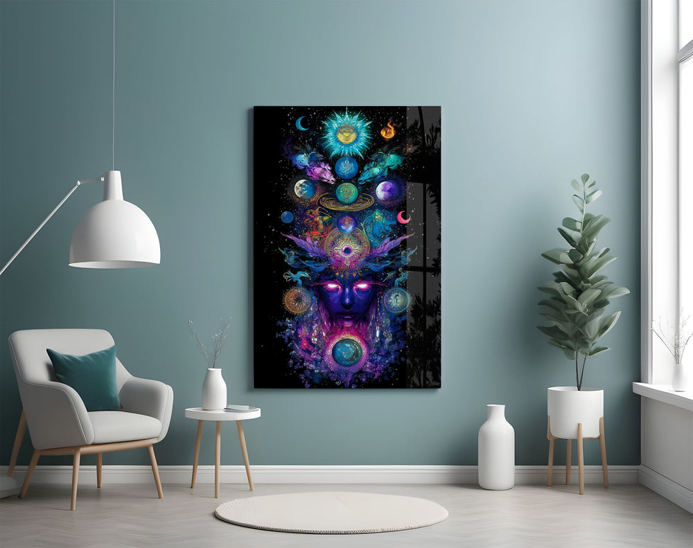 a cosmic deity crowned with planets glass wall art styled above an armchair in a reading corner