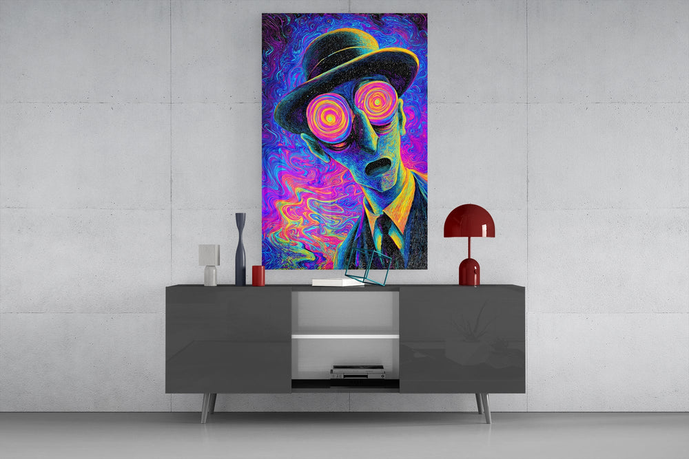a wide-eyed man in a bowler hat glass wall art displayed above a console in a designer interior