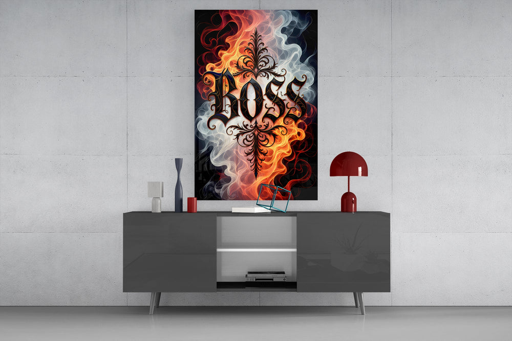 blackletter word in fire and smoke glass wall art displayed above a console in a designer interior