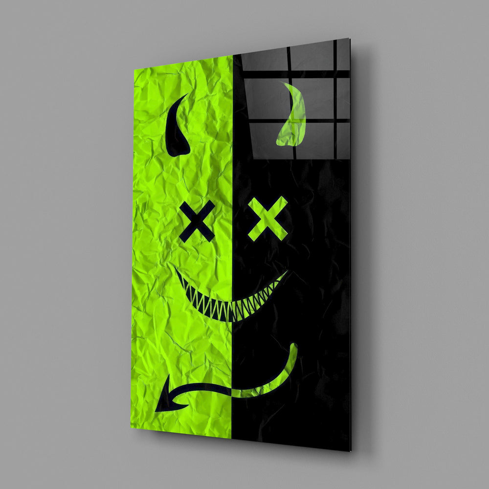 split neon green devil smiley glass wall art angled to show the polished tempered glass panel