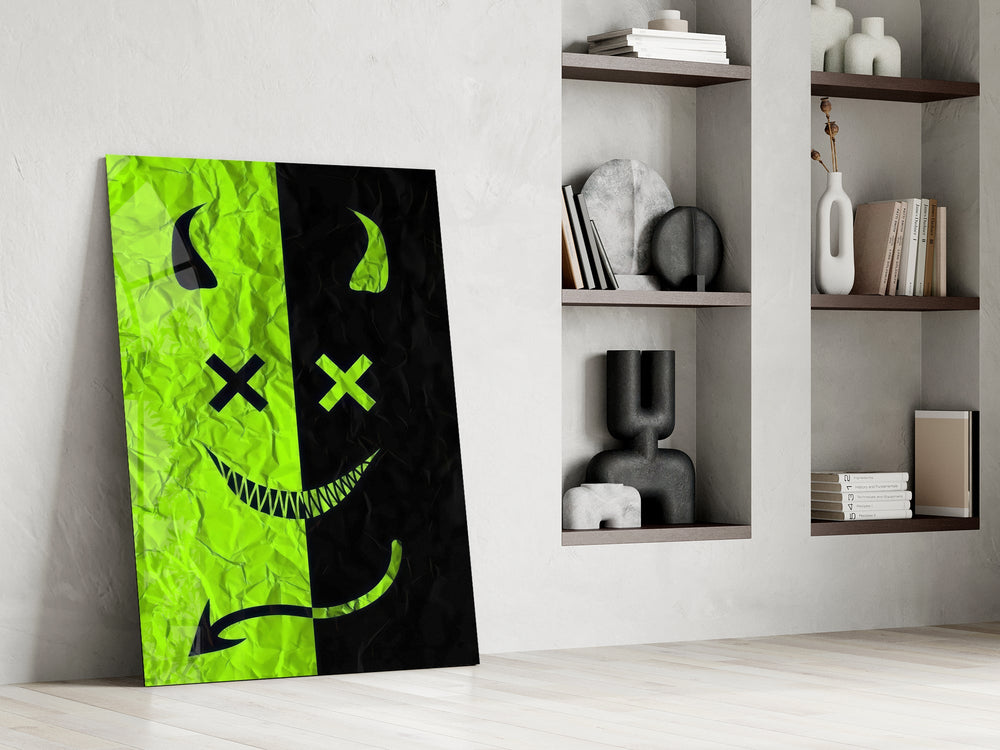 split neon green devil smiley panel resting in a shelving niche in a modern interior