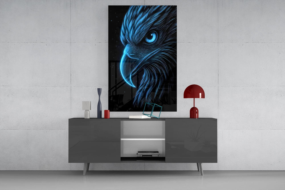 glowing blue eagle head on black glass wall art displayed above a console in a designer interior