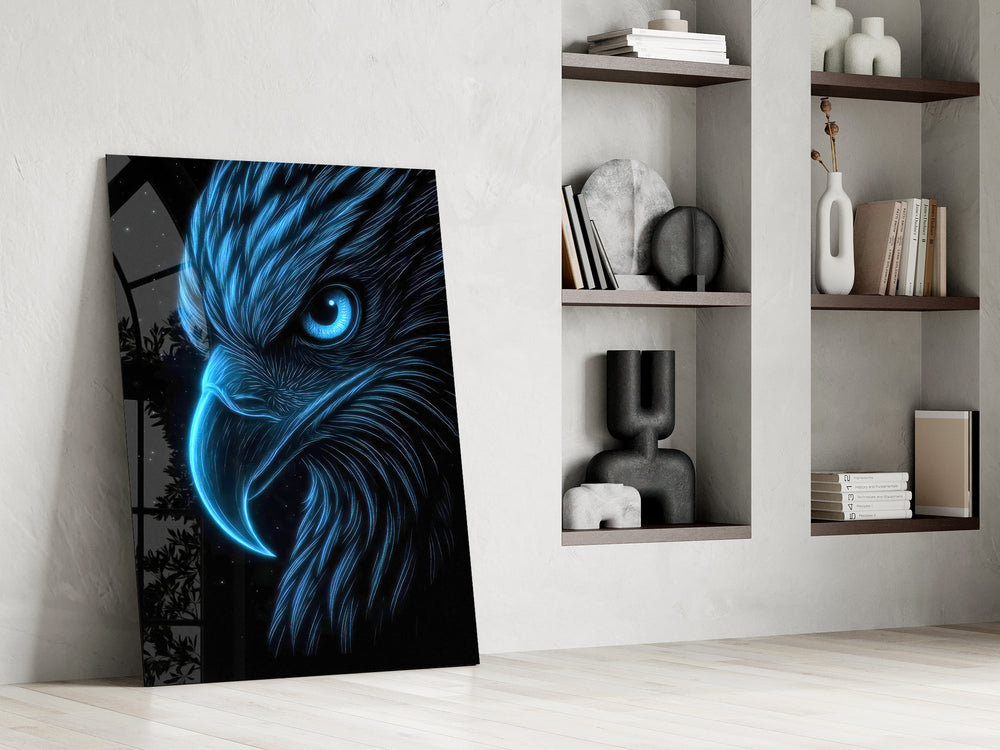 glowing blue eagle head on black panel resting in a shelving niche in a modern interior