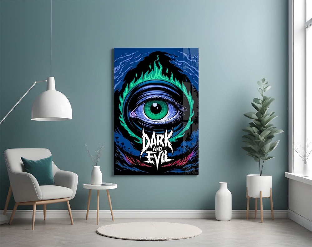 green flame eye over a night coastline glass wall art styled above an armchair in a reading corner
