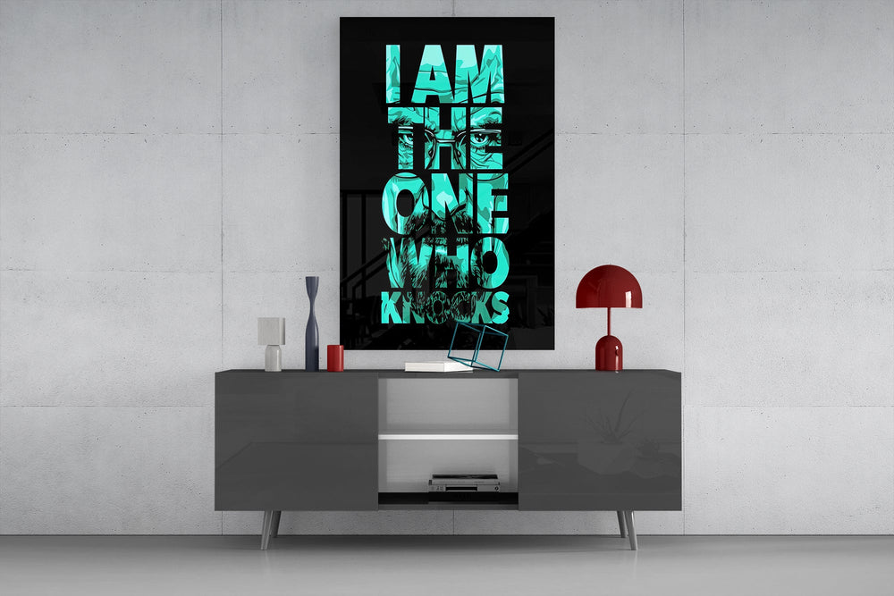 turquoise word stack hiding a face glass wall art displayed above a console in a designer interior