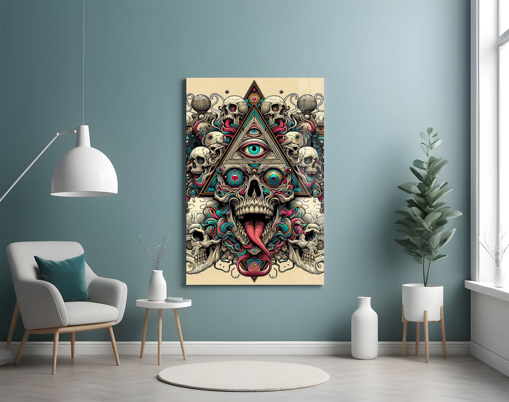 all seeing eye above a horned skull glass wall art styled above an armchair in a reading corner