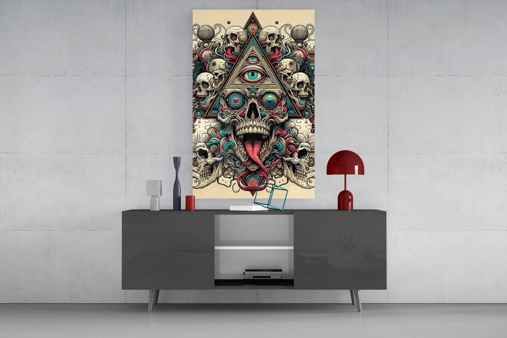 all seeing eye above a horned skull glass wall art displayed above a console in a designer interior