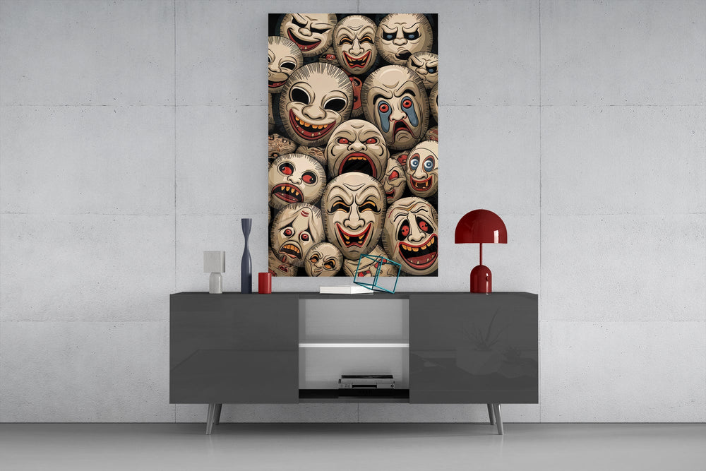 stacked sepia theatre masks glass wall art displayed above a console in a designer interior