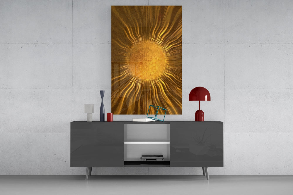 a radiant golden sunburst glass wall art displayed above a console in a designer interior