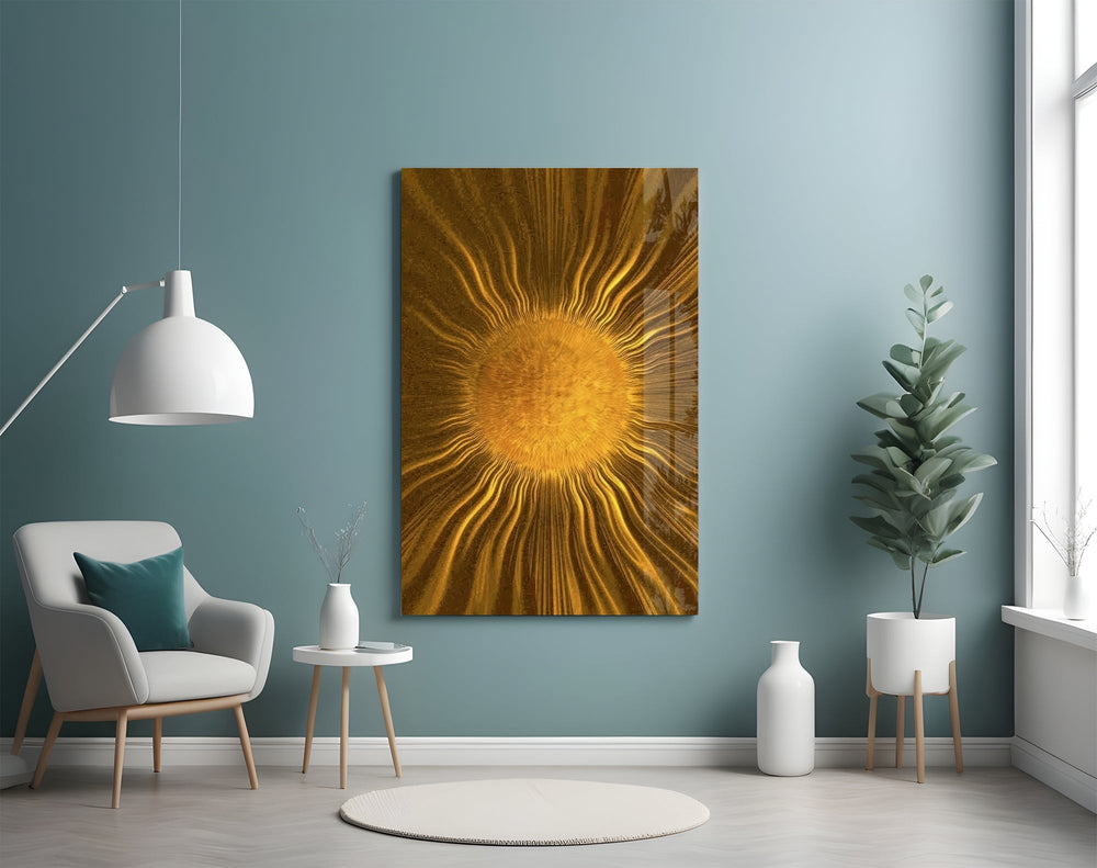 a radiant golden sunburst glass wall art styled above an armchair in a reading corner