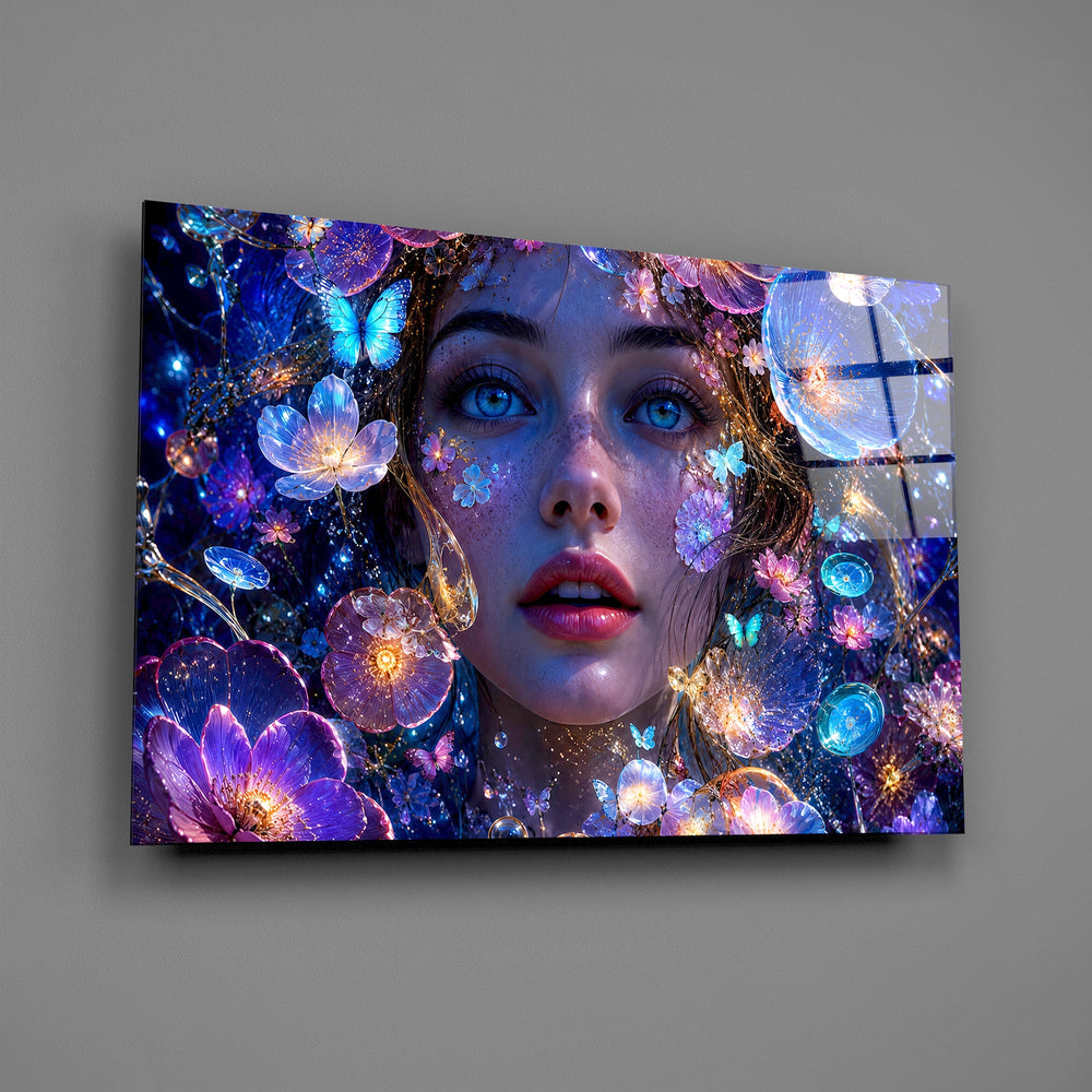 a blue-eyed woman among glowing flowers glass wall art angled to show the polished tempered glass panel